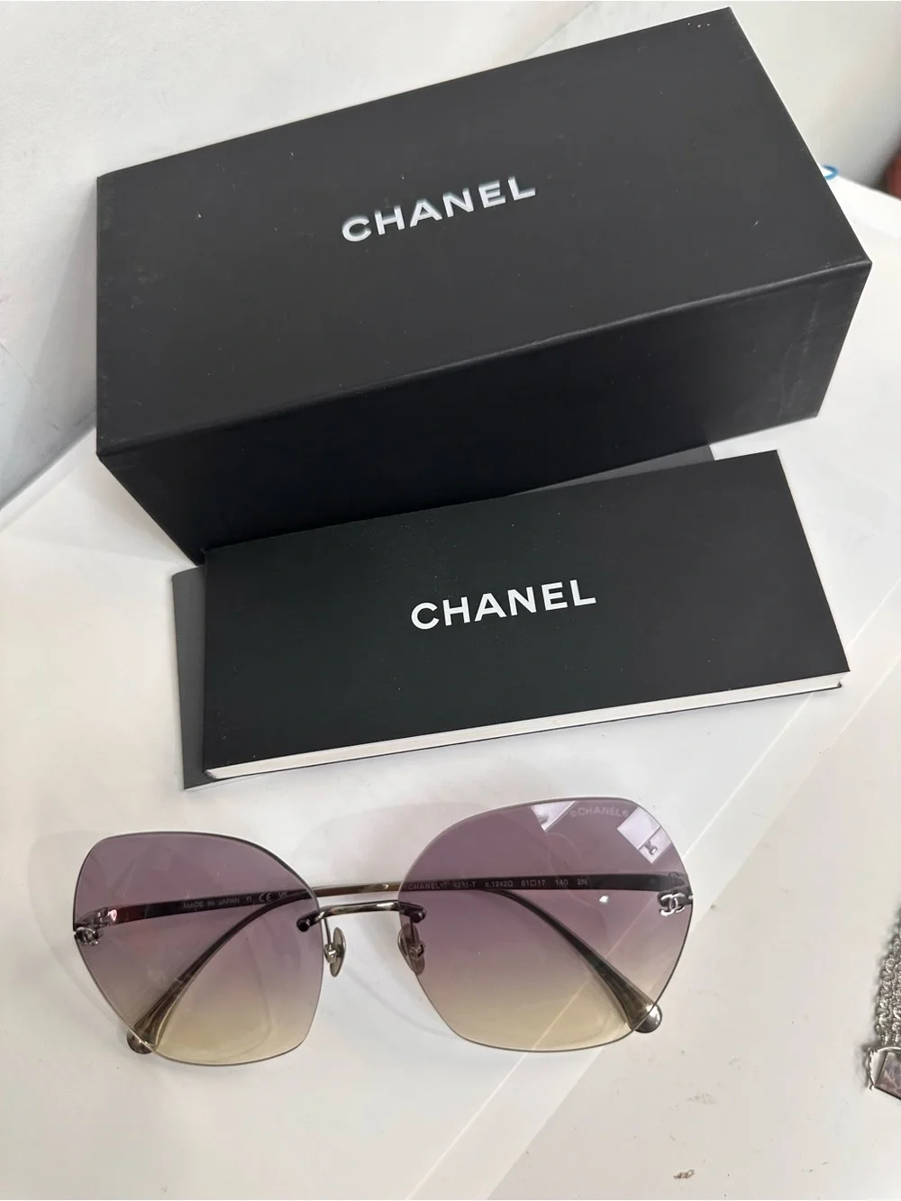 CHANEL Purple Gradient Rimless Sunglasses with Black Quilted Case